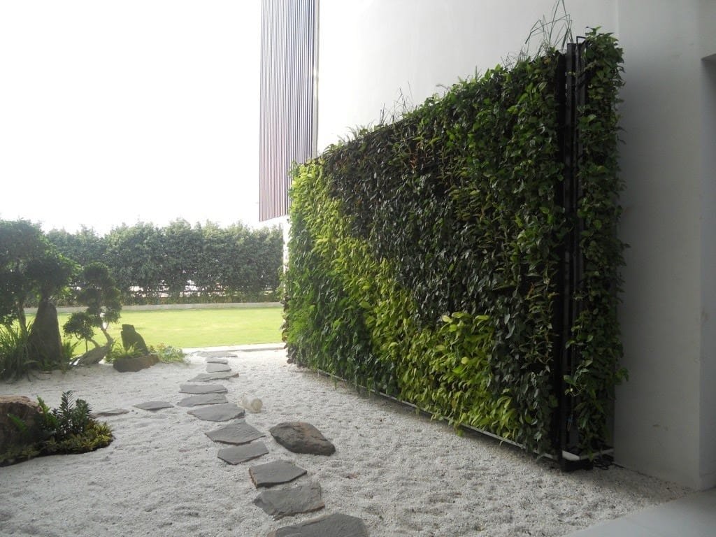 Checkerboard grass and paver design