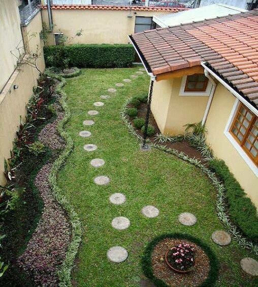 Checkerboard grass and paver design